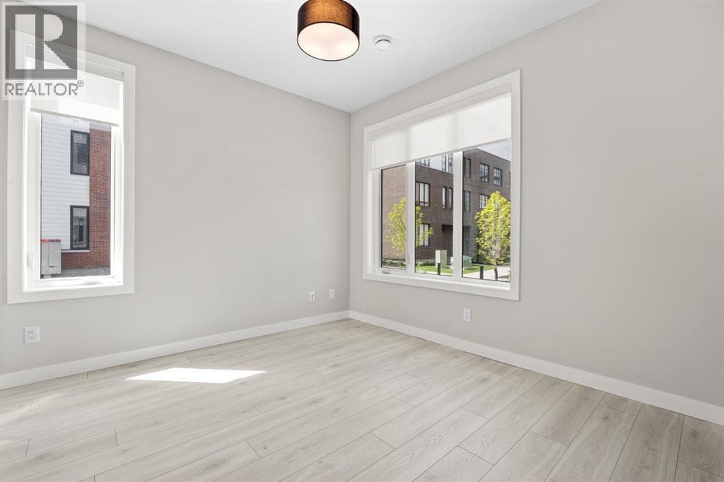 203, 8155 8 Avenue SW property photo 3