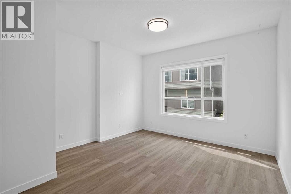 202, 101 Panatella Square NW property photo 5