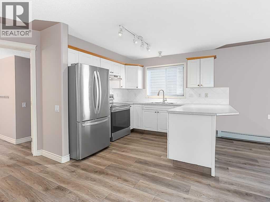 2102, 7451 Springbank Boulevard SW property photo 11